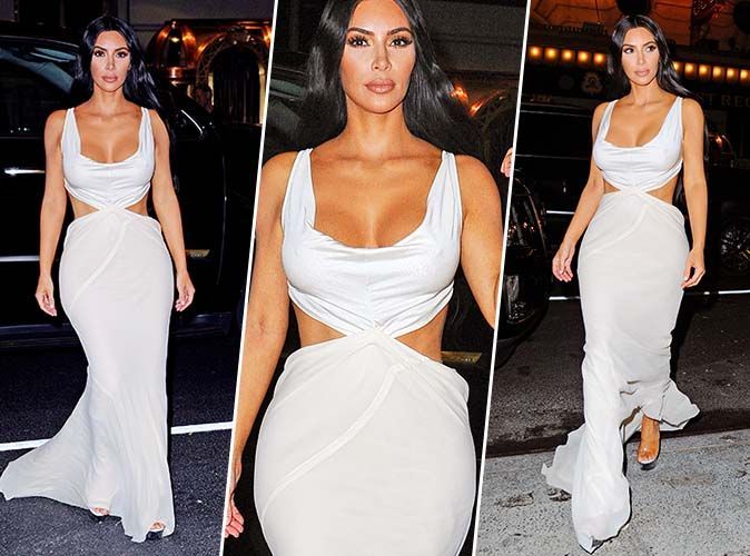 Kim Kardashian en une robe de soirée blanche sexy découpé